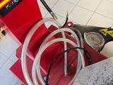 a red machine that is sitting on top of a table