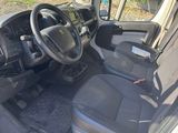 an image of a car with the driver ' s seat down