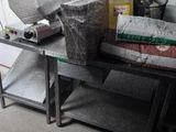 an image of a kitchen with a table with a pizza cutter on it