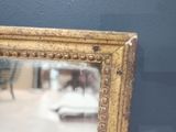 a mirror that is sitting on a table