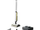 a close up of a vacuum cleaner and other items on a white surface