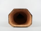 a close up of a piece of wood with a hole in it