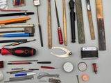 many different tools that are sitting on a table