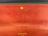 the inside of a chanel bag with a zipper