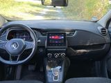 the interior of a car with a steering wheel, dashboard, and dash board