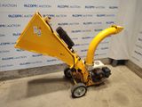 an image of a small machine that is sitting on the ground