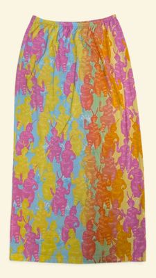 the skirt is multicolored and has a pattern of flowers on it