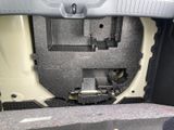 a close up of the inside of a car ' s trunk