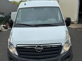 a picture of a white van parked in a parking lot
