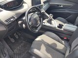the interior of a car with a steering wheel, dashboard, and dashboard controls