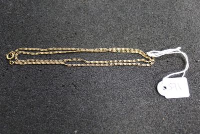 a close up of a chain with a tag attached to it