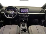 the interior of a car with a steering wheel, dashboard, and dash board