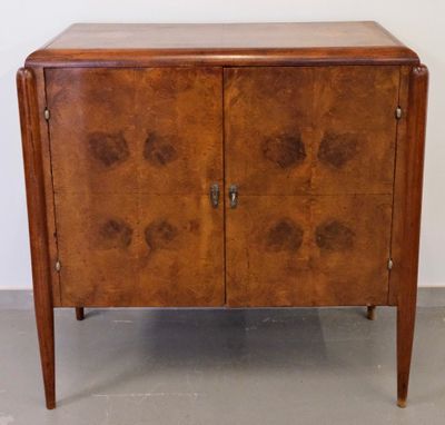 an image of a wooden cabinet with two doors and two drawers
