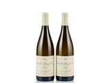 two bottles of wine sitting next to each other on a white surface