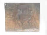 a plaque with a man and a woman on it