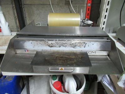 an image of a commercial pizza oven in a kitchen