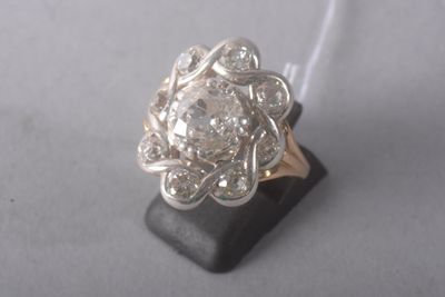 an image of a diamond ring on a black stand