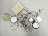 a pile of assorted jewelry on the floor
