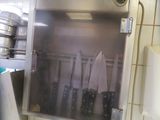 a picture of a kitchen with a lot of pots and pans