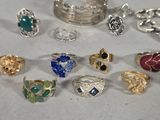 a lot of rings that are sitting on a table
