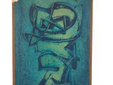 un tableau représentant une peinture bleue et verte sur un châssis en bois