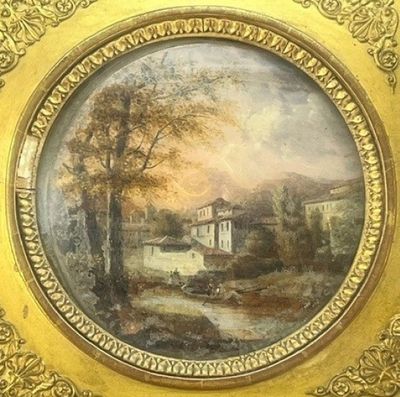 une image d'un tableau représentant un paysage dans un cadre doré