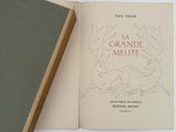 an open book with a drawing of a deer on it