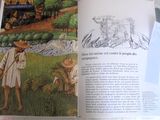 un livre ouvert sur lequel figure l'image d'un agriculteur dans un champ
