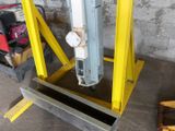 a large machine that is sitting in a garage