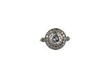 a close up of a diamond ring on a white background