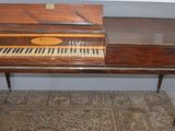 a piano that is sitting on top of a table