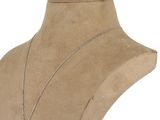 a close up of a mannequin torso with a necklace on it