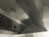 an image of a stainless steel kitchen exhaust hood