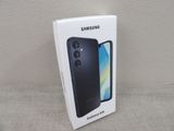 the box of the samsung galaxy a9 is open on the couch