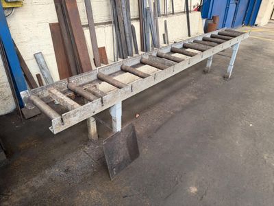 a picture of a long wooden bench in a garage