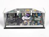 a glass display case with a variety of items inside of it