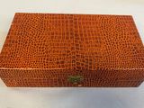 an image of a wooden box that is on a white surface