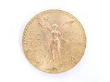 l'image d'une pièce d'or ornée d'un ange