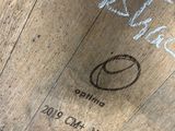 a close up of a wooden barrel with writing on it