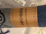 a close up of a person ' s sock with a label on it