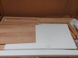 a piece of wood that is sitting on top of a box