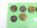a green piece of paper with a bunch of coins on it