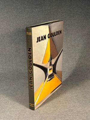 the book jean golden is sitting on a gray surface