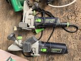 two circular saws and a circular cutter on a table
