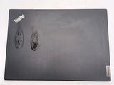 a black mouse pad with a pair of shoes on it