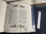 an open book with a picture of a train on it