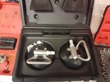 a box with a couple of tools inside of it