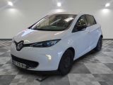 a picture of a white car in a showroom