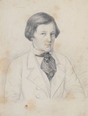 portrait d'un jeune homme en veste blanche et cravate