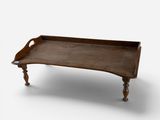 a wooden tray that is sitting on a table